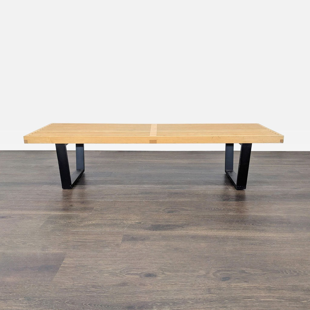 Midcentury modern maple slat bench with ebonized wood legs designed by George Nelson for Herman Miller.