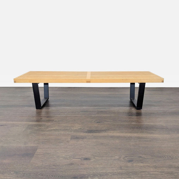 Midcentury modern maple slat bench with ebonized wood legs designed by George Nelson for Herman Miller.