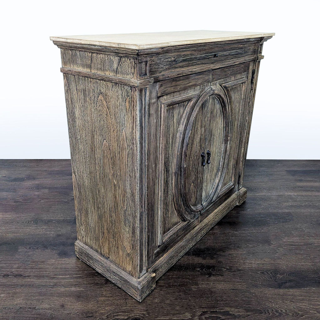 Two Door Cabinet with Molded Designs on Doors