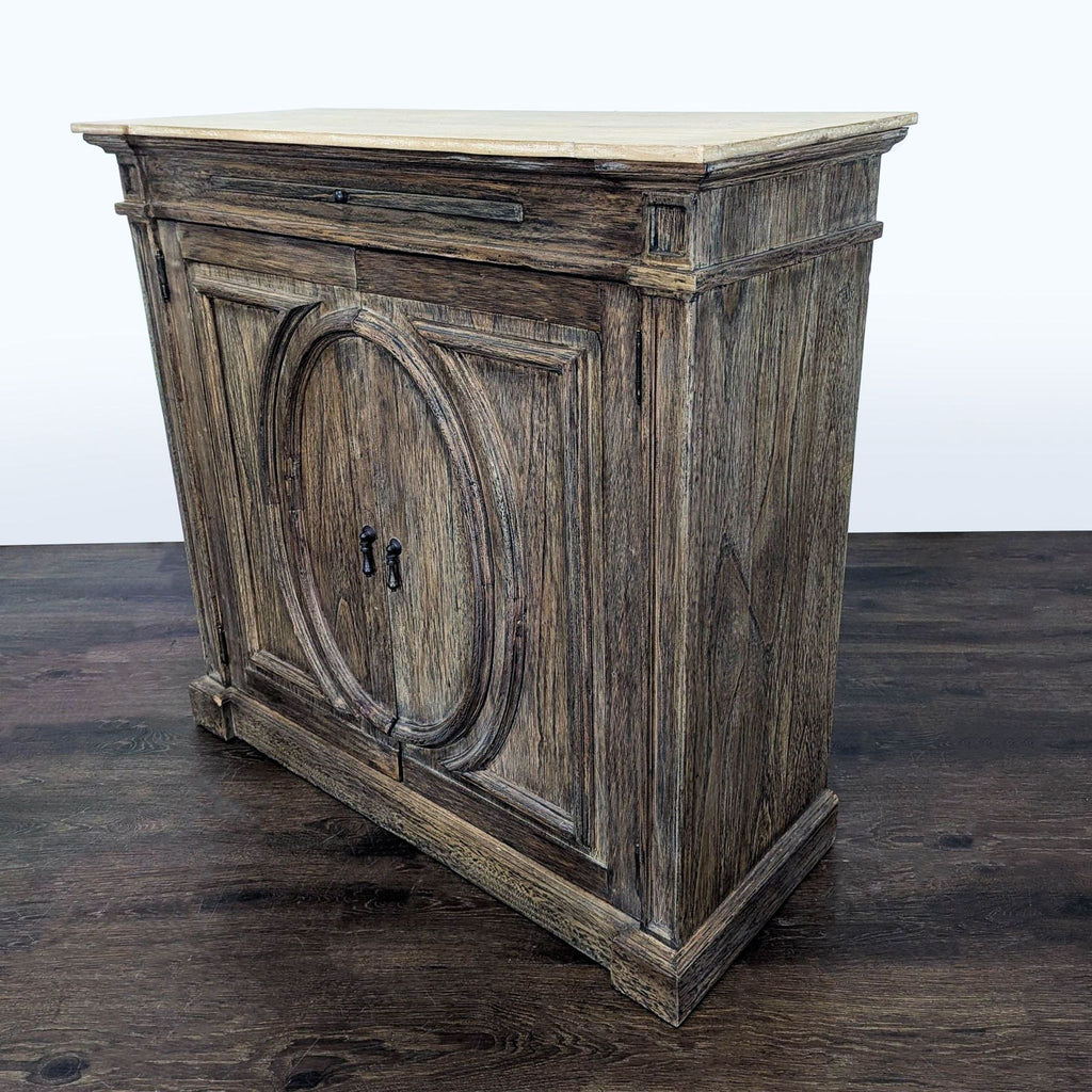 Two Door Cabinet with Molded Designs on Doors