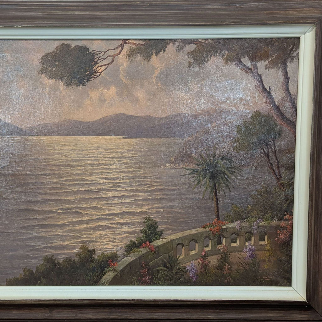 3. J. Andre artwork featuring sunset over mountains, vibrant flowers, and terrace, framed with cream and wood.