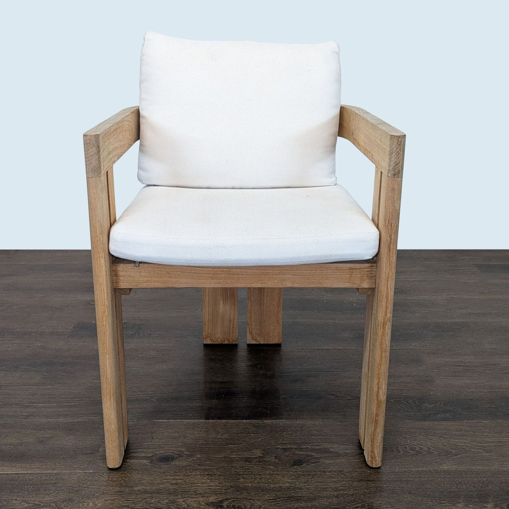 Restoration Hardware chair with weathered teak frame and white cushions, modern and gently used.