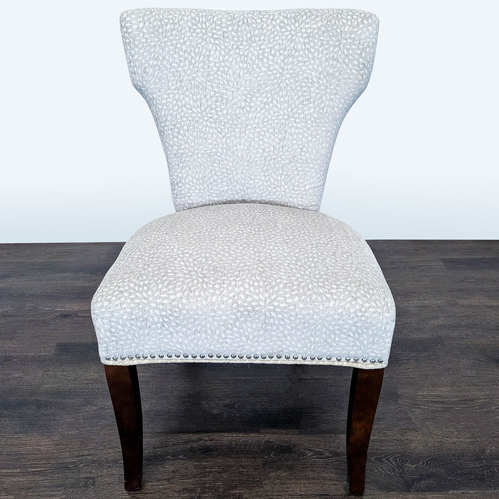 Modern Lounge Chair with Light Patterned Fabric and Dark Wood Legs