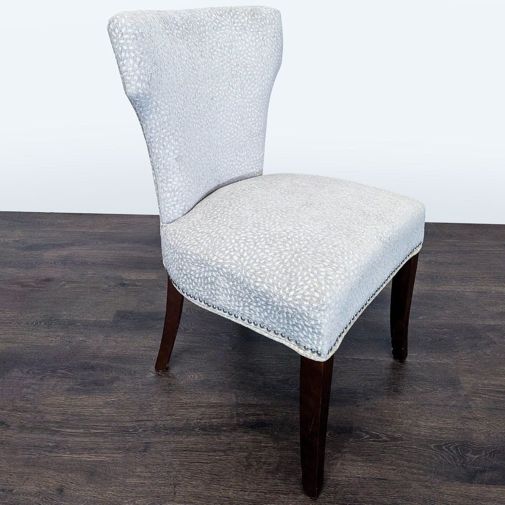 Modern Lounge Chair with Light Patterned Fabric and Dark Wood Legs