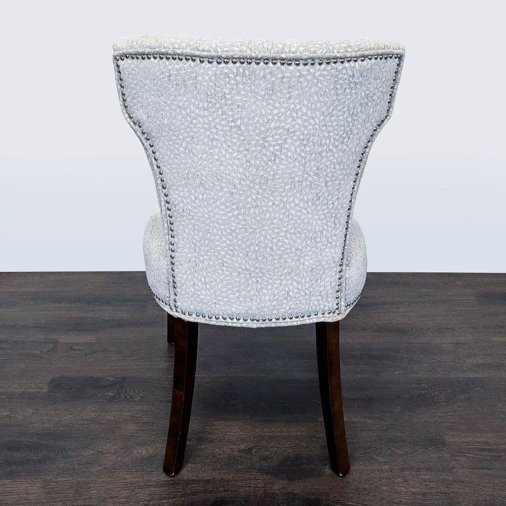 Modern Lounge Chair with Light Patterned Fabric and Dark Wood Legs