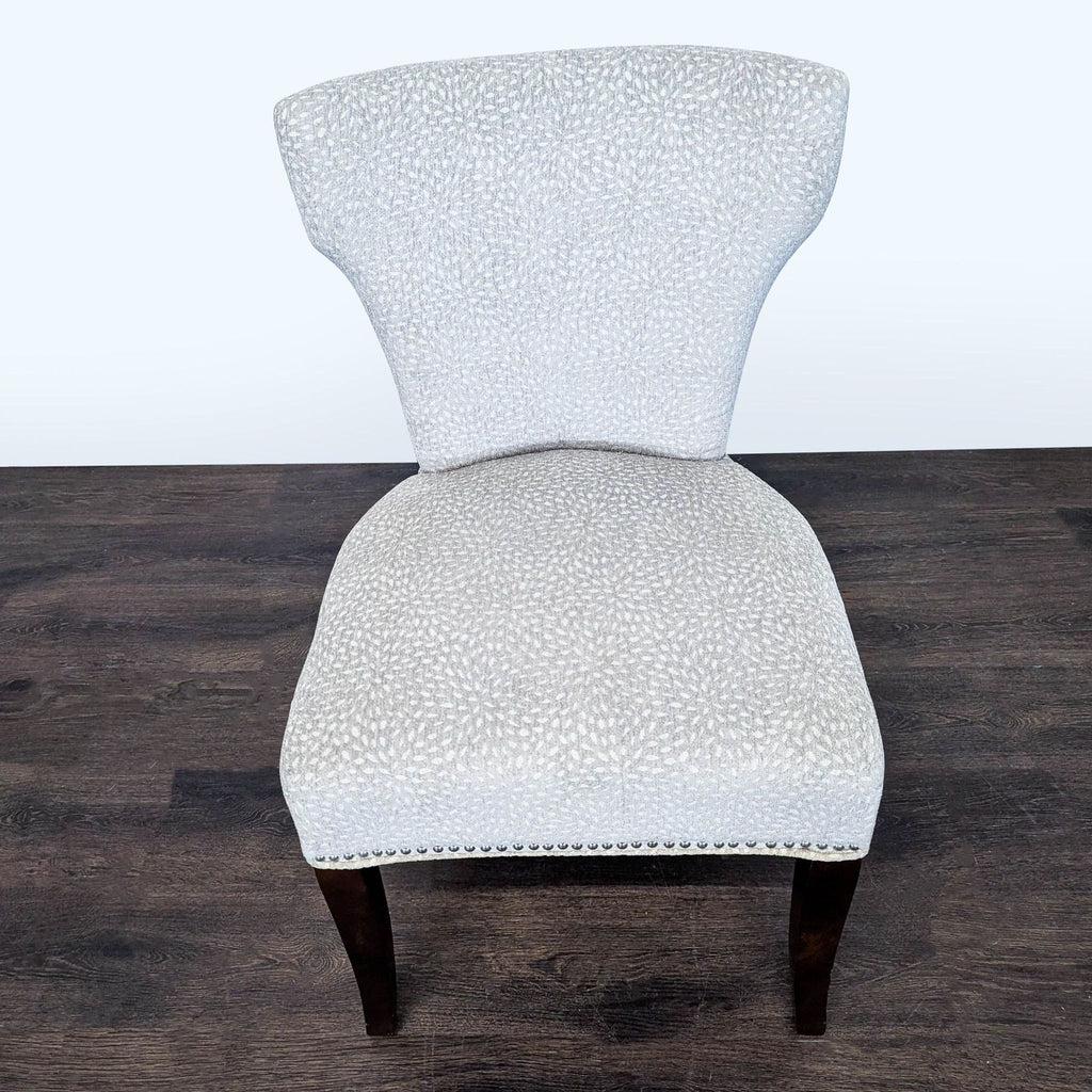 Modern Lounge Chair with Light Patterned Fabric and Dark Wood Legs