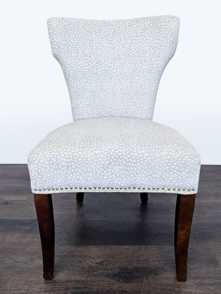 Modern Lounge Chair with Light Patterned Fabric and Dark Wood Legs