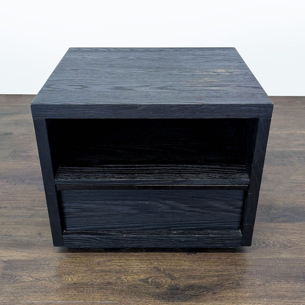 Restoration Hardware end table with black oak finish, chrome accents, and bold postmodern silhouette.