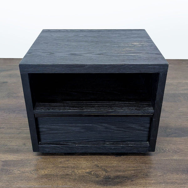 Restoration Hardware end table with black oak finish, chrome accents, and bold postmodern silhouette.