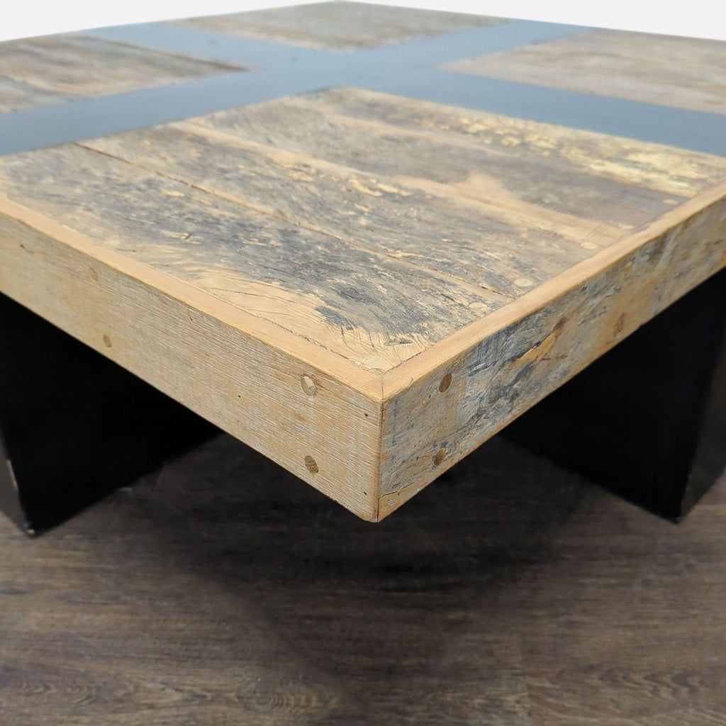 Coffee table featuring a textured wooden surface and a sleek black wood border accent.