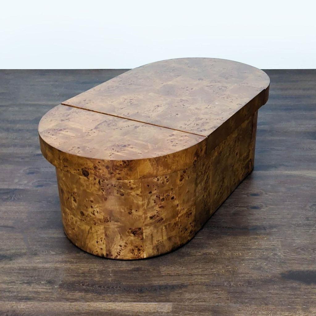 Frontgate modular coffee table set with burl wood finish, two nestable half-moon stools, and oval design.