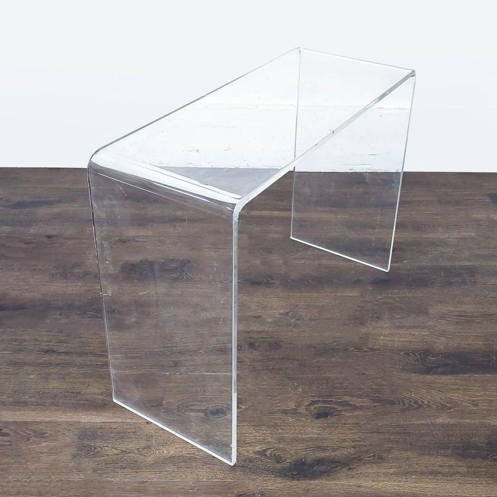2. Transparent acrylic waterfall console table by GarveeHome, durable and wear-resistant construction.  