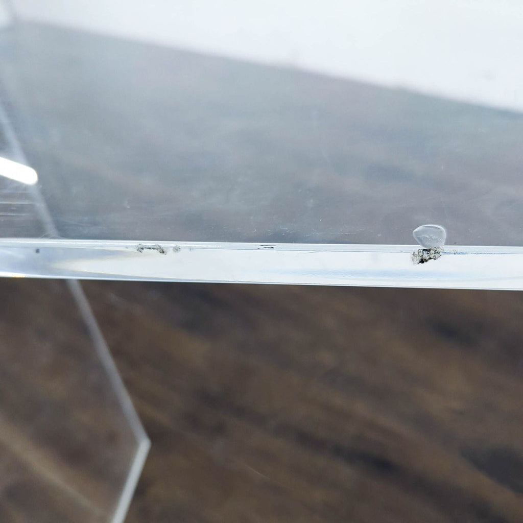 3. Modern GarveeHome side table with curved acrylic, showcasing its stylish and sturdy waterfall shape.