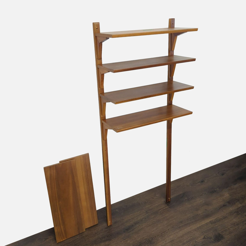 Modern West Elm wood bookshelf with six shelves, ideal for books and decor; sleek and easy to assemble design.