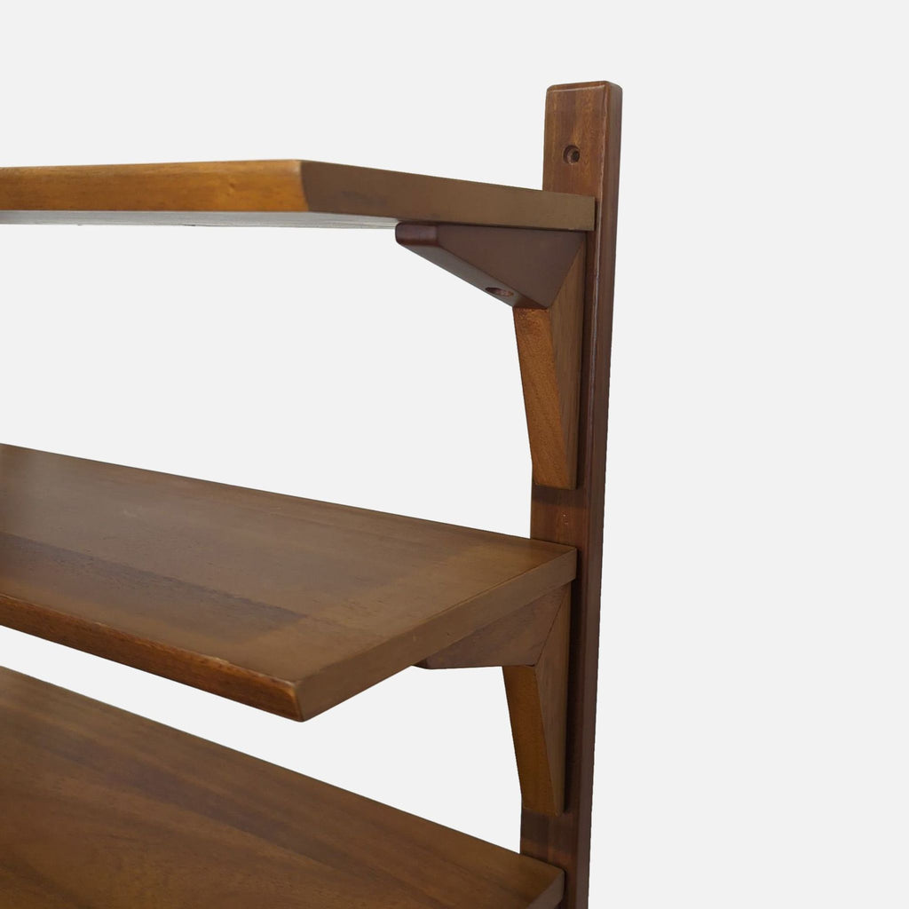Sleek West Elm shelving unit featuring six spacious shelves and a sturdy frame, perfect for home or office organization.