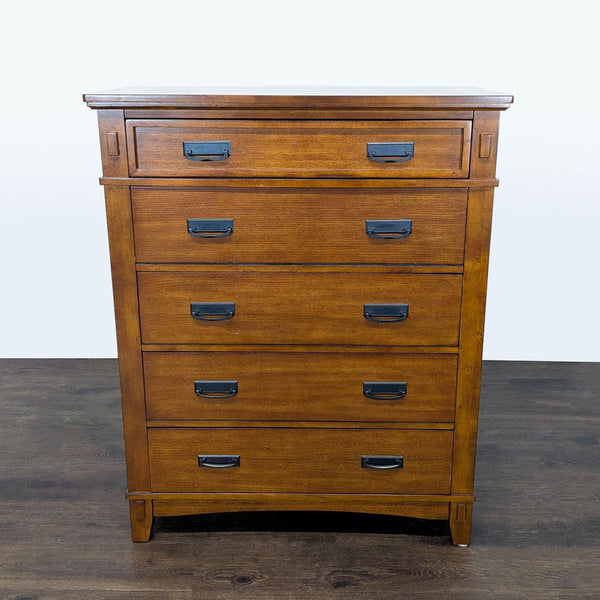 1. Ashley Furniture brown wood dresser with five drawers and black handles, perfect for bedroom storage.  