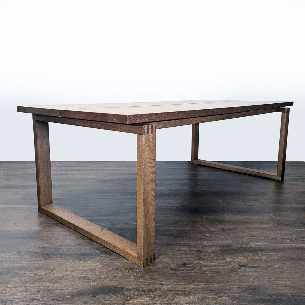 Ikea dining table featuring an oak veneer and distinct plank design.  
