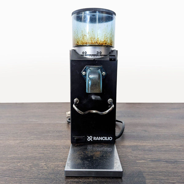 Rancilio Rocky doserless coffee grinder with adjustable settings, shows signs of use but functions well.