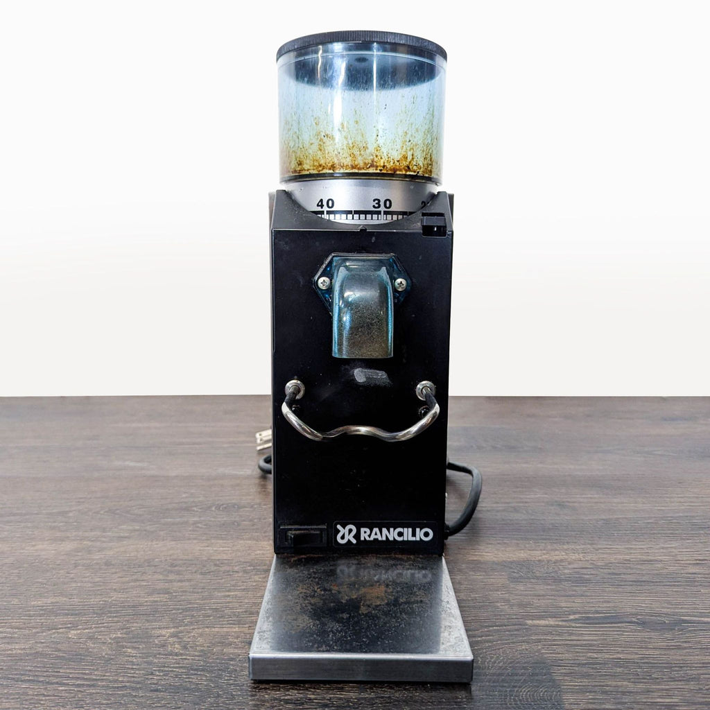 Rancilio Rocky doserless coffee grinder with adjustable settings, showing use but in good working condition.