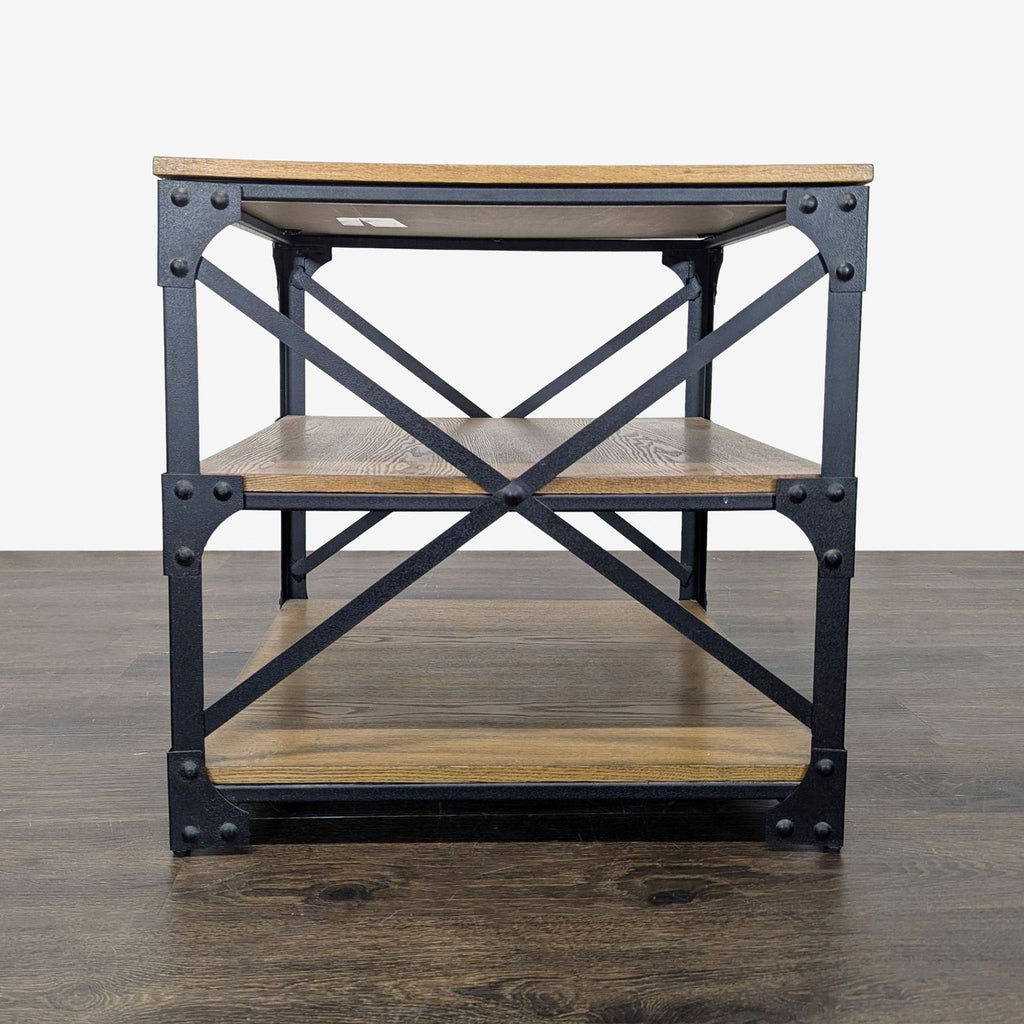 End Table with black metal frame, three shelves, and rustic wood accents for storage.  