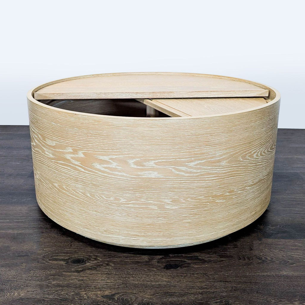 Modern coffee table by West Elm, featuring kiln-dried wood and a light washed oak water-based finish.