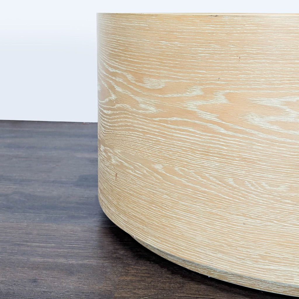 Washed oak finish coffee table by West Elm, made from kiln-dried wood, in a minimalist design.