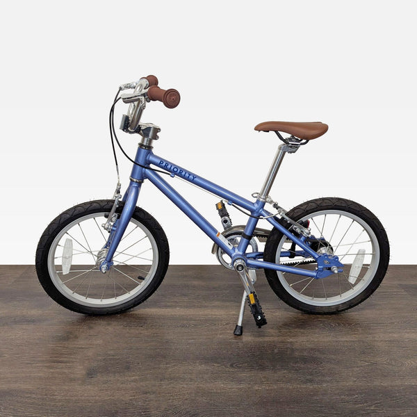 Priority kids’ bike with 16-inch wheels, lightweight frame, and comfortable seat for safe outdoor adventures.