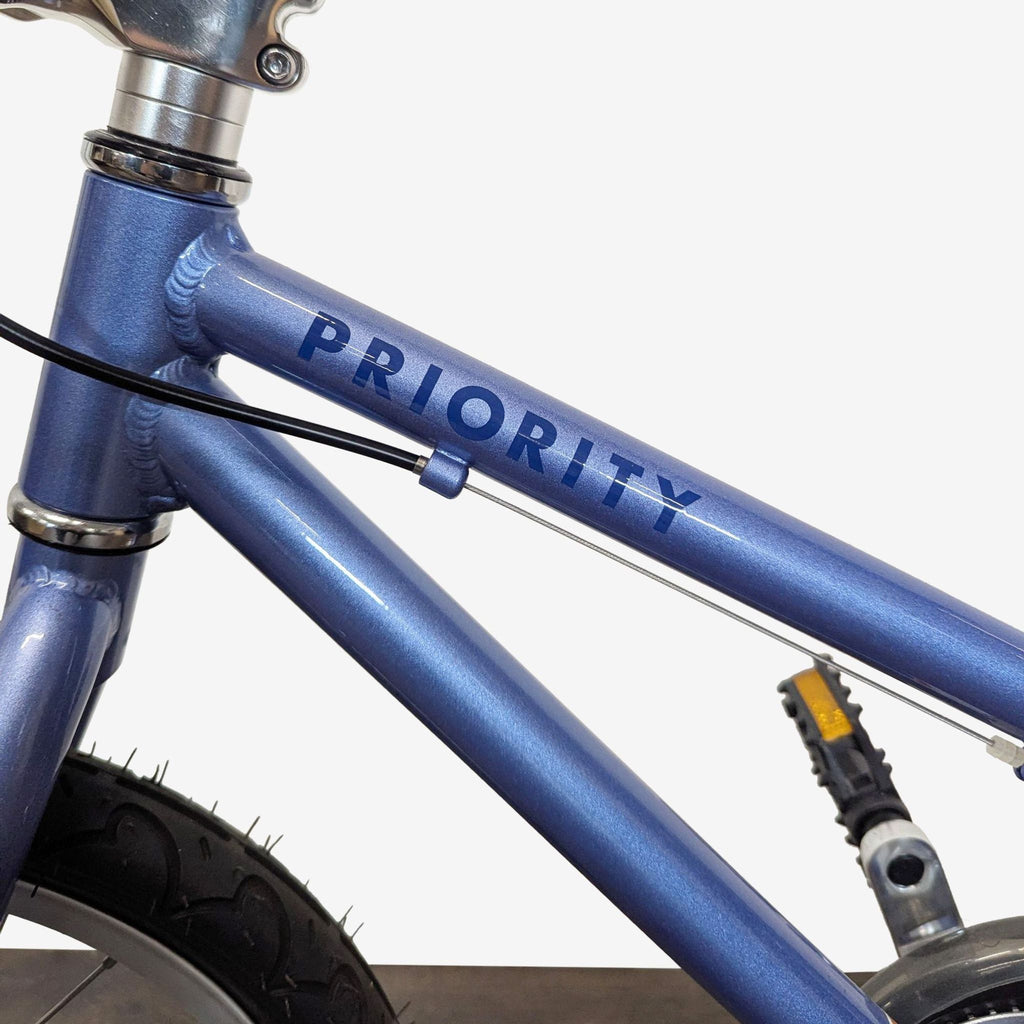 Priority 16-inch kids’ bike with lightweight build, padded seat, and simple maintenance—ideal for young riders.