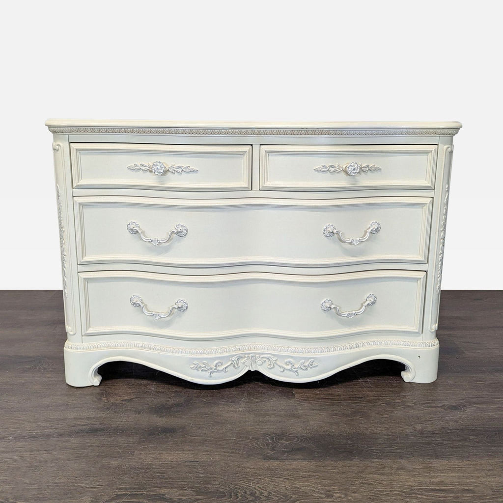 1. White wooden dresser with six drawers by Lea Industries, featuring classic handles and a simple design.
