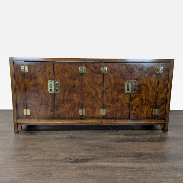 Drexel Heritage Dynasty dresser with burl walnut veneer, brass hardware, and Asian-inspired details, shown closed.