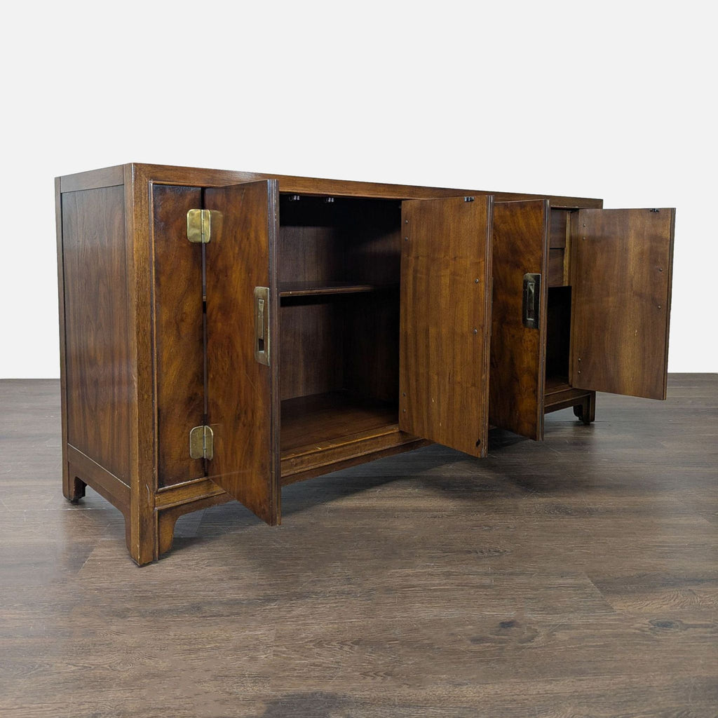 Burl walnut Drexel Heritage credenza featuring campaign-style hardware, adjustable shelves, and rich wood grain.