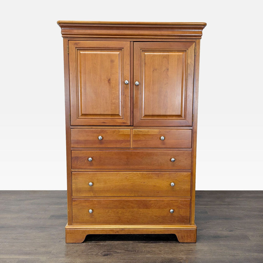 Cherry-finished Stanley Furniture dresser with upper drawers, paneled doors, and spacious lower storage.  