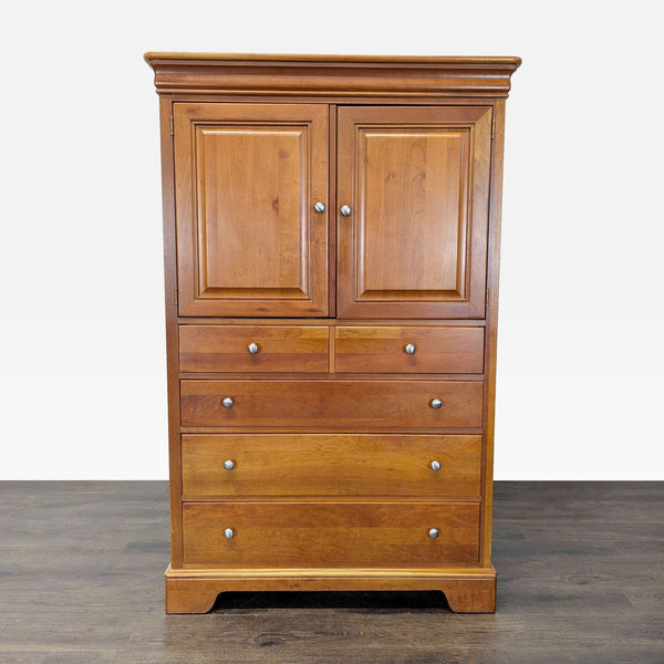 Cherry-finished Stanley Furniture dresser with upper drawers, paneled doors, and spacious lower storage.  