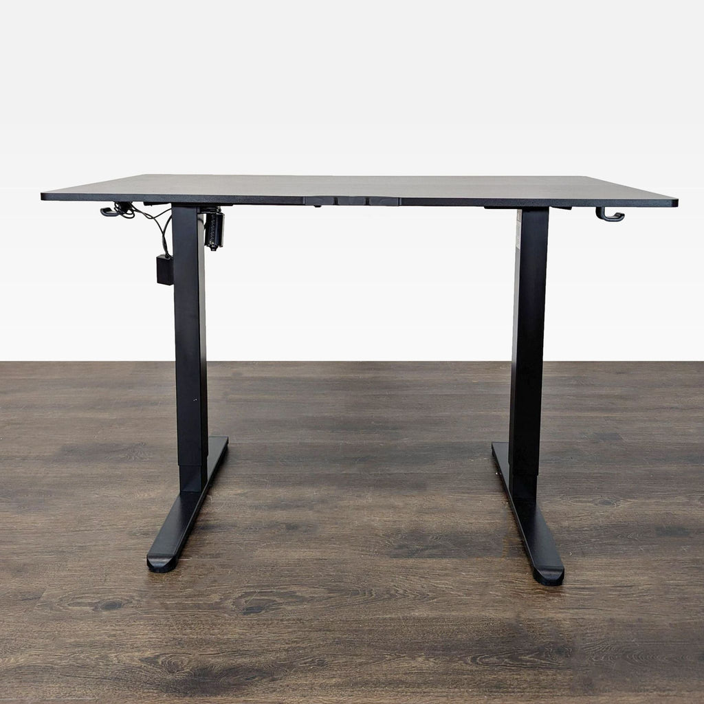 ErGear adjustable desk for work or study, featuring electric height control, roomy top, and convenient bag or headphone hook.