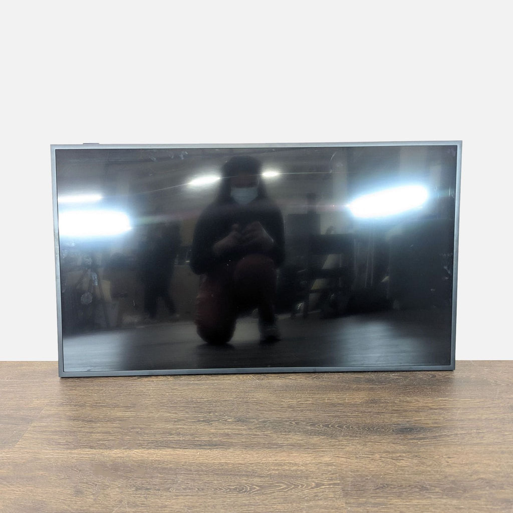 Sleek Samsung Frame TV, 43-inch model, shown as wall art with clear image and minimal bezel.