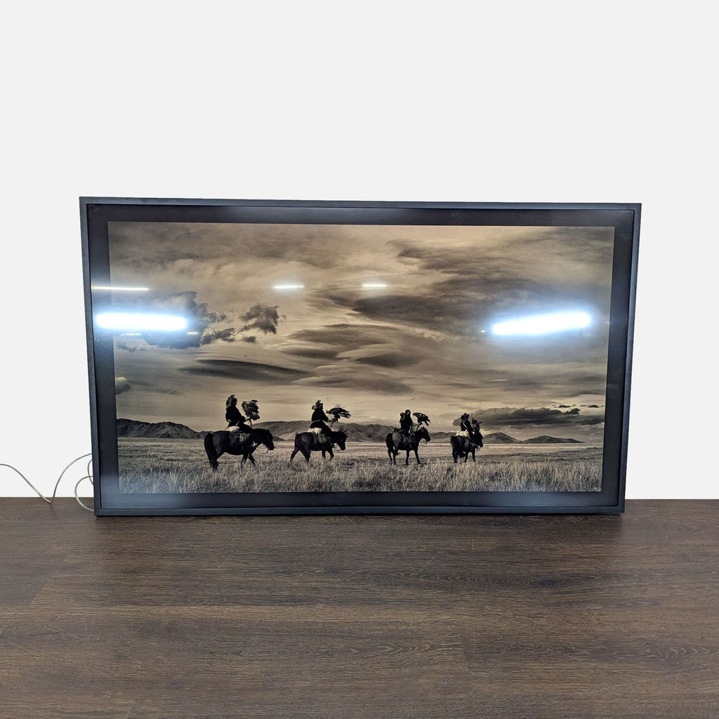 Samsung 43-inch Frame TV mounted on a wall, displaying vibrant 4K art in a slim, modern design.