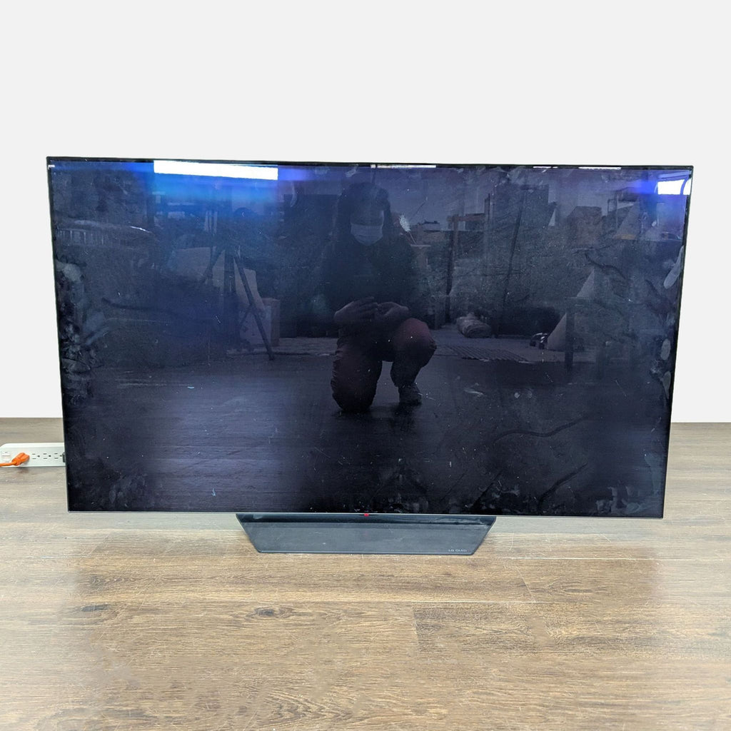 LG 55-Inch Flat Screen TV with Stand - Crisp Display, Tested Working