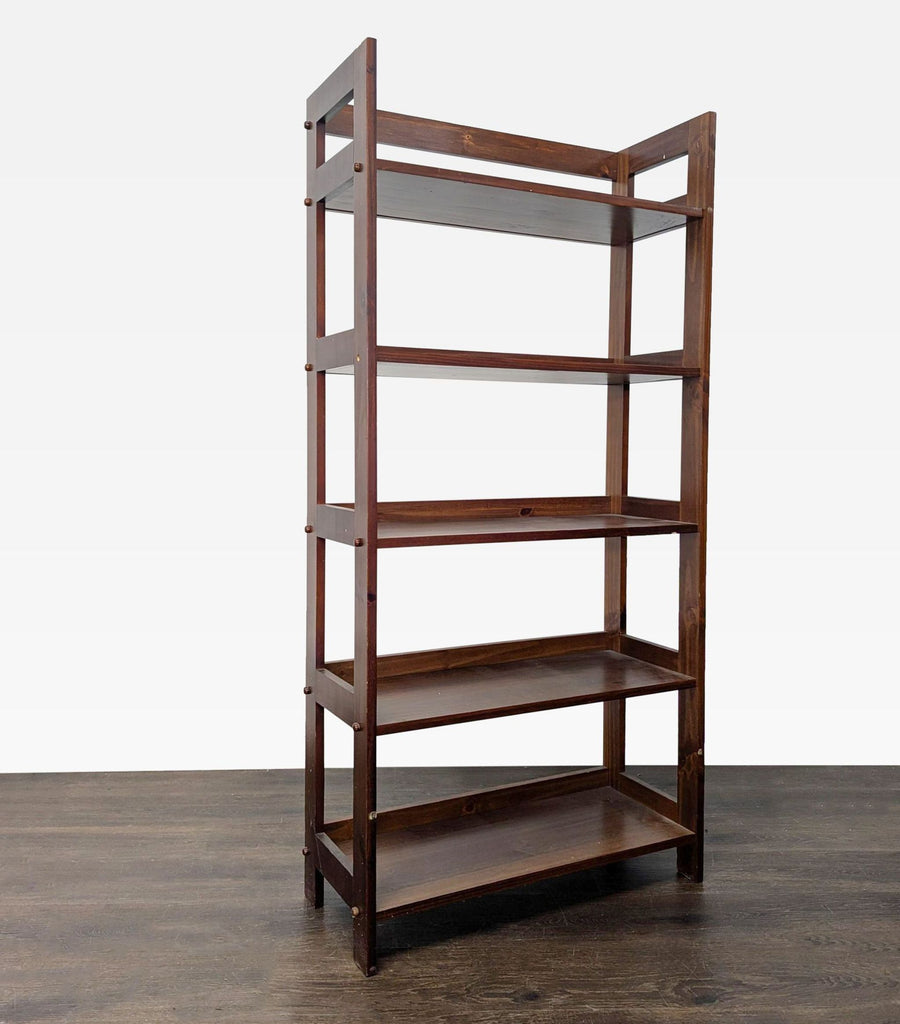 Tall, 5-tier bookshelf in a rich dark brown finish, designed for ample book or decor storage.