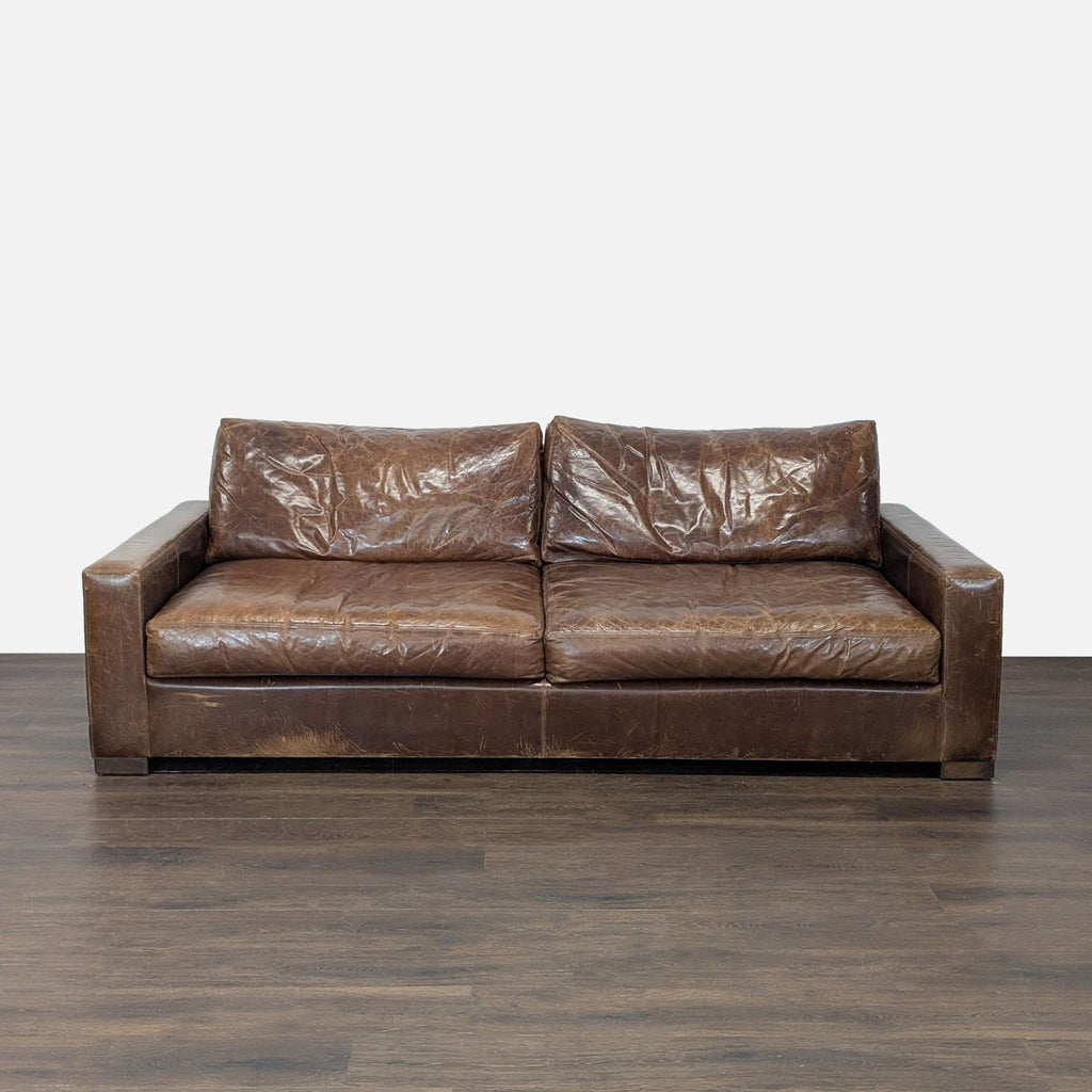 Brown leather 3-seat sofa by Thrive Furniture, featuring vintage style, wide armrests and deep, comfy cushions.