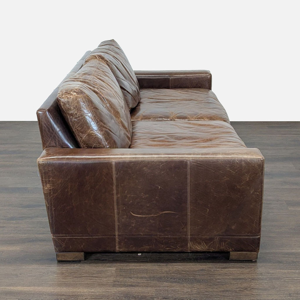 Vintage-look brown leather 3-seat sofa by Thrive Furniture with plush cushions, ideal for living rooms or lounges.