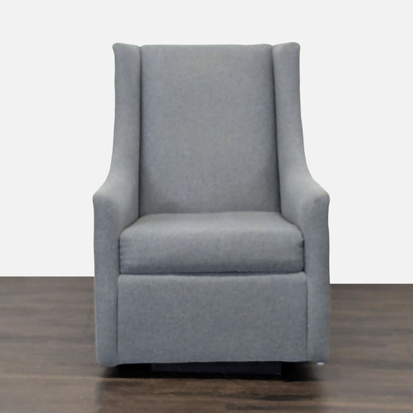 West Elm gray rocking lounge chair with clean lines and cushioned seat, ideal for modern living rooms.