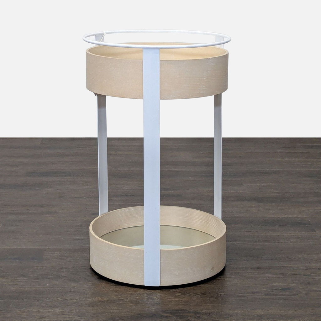 Two-tier side table with wheels for mobility, featuring a modern minimalist design.  