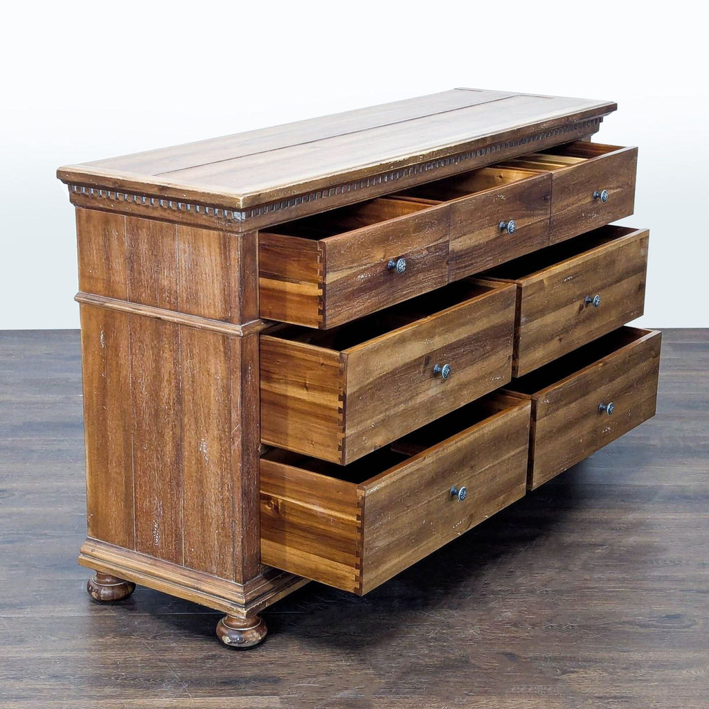 Seven-drawer solid wood dresser by Restoration Hardware Baby and Child, sturdy and spacious for storage.