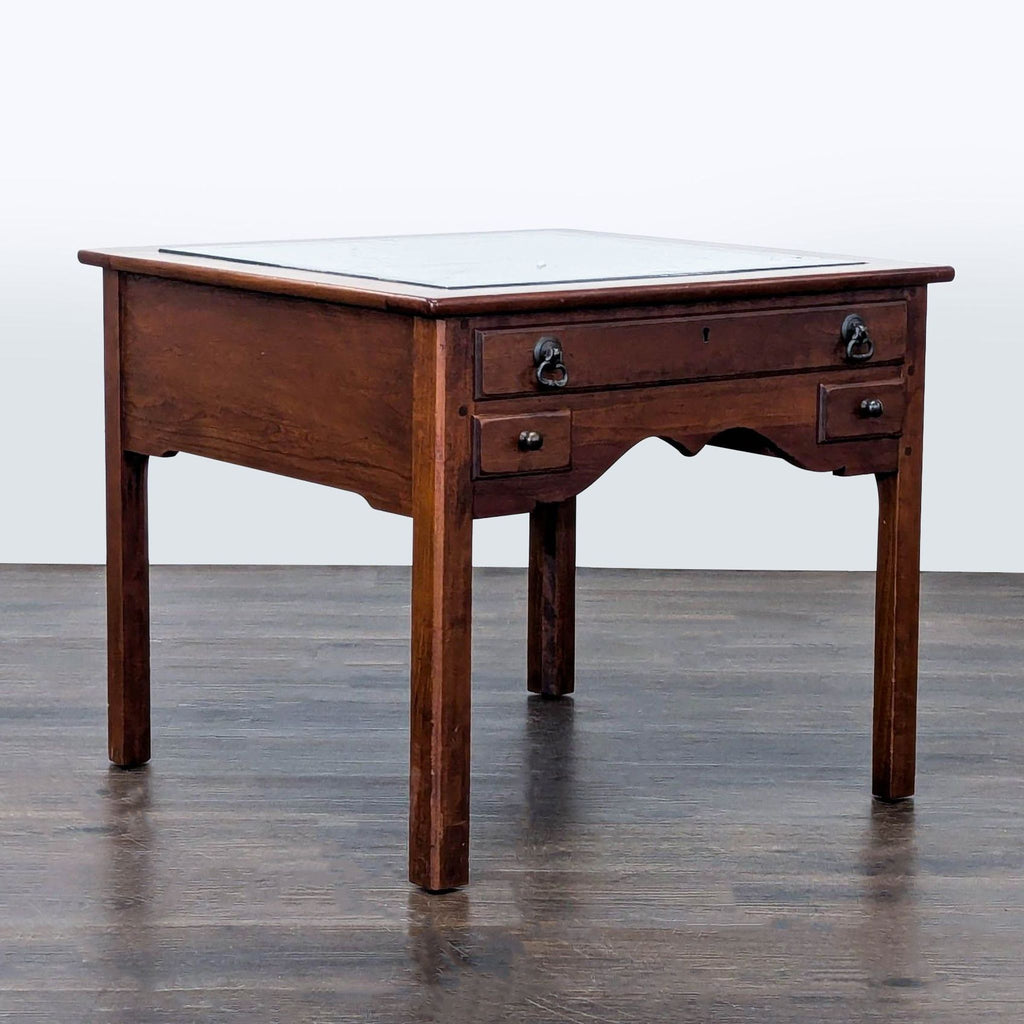 Ethan Allen end table featuring a glass display surface, felt lining, and three storage drawers.
