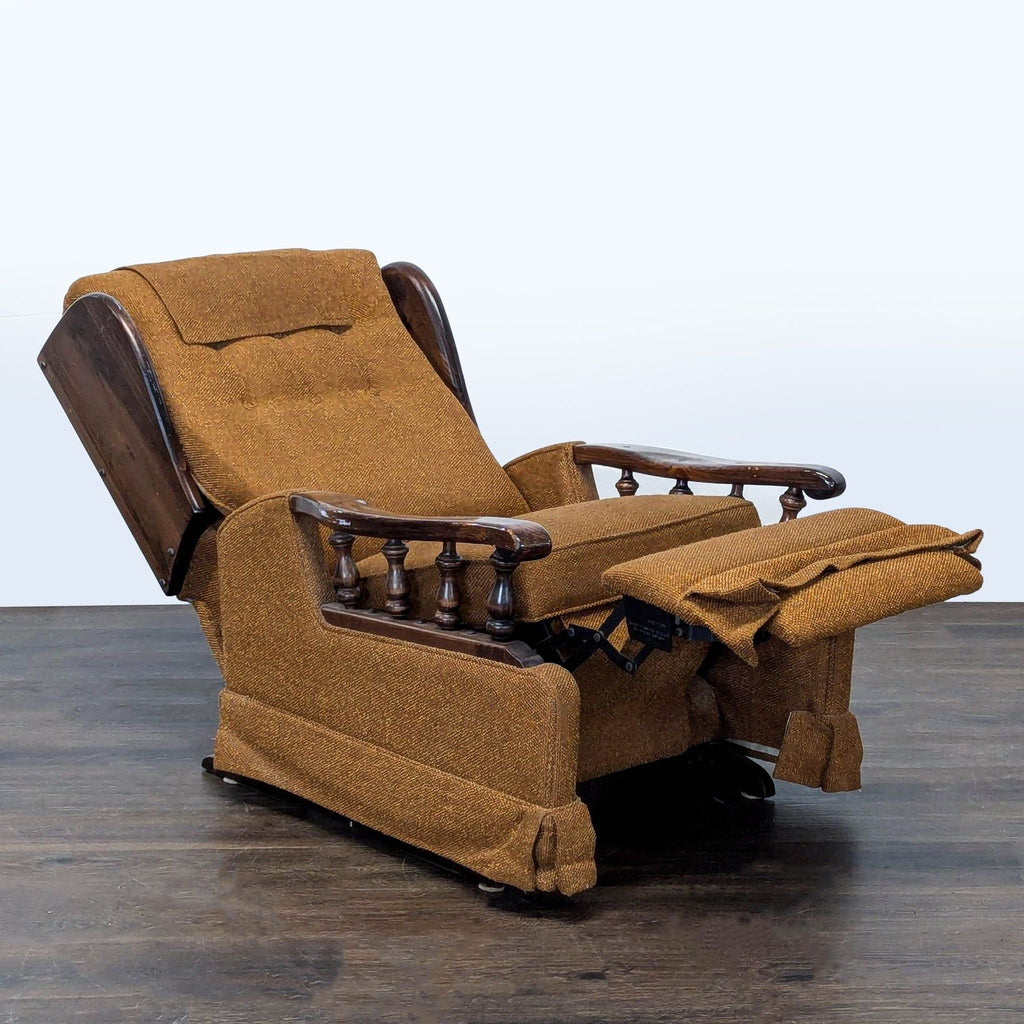 Cozy recliner in brown fabric featuring classic tufting, sturdy wood arms, and an extendable footrest.  