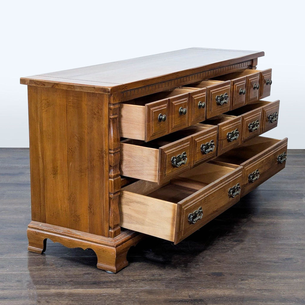 Sturdy Sumter dresser featuring spacious storage, traditional design, and decorative brass drawer pulls.