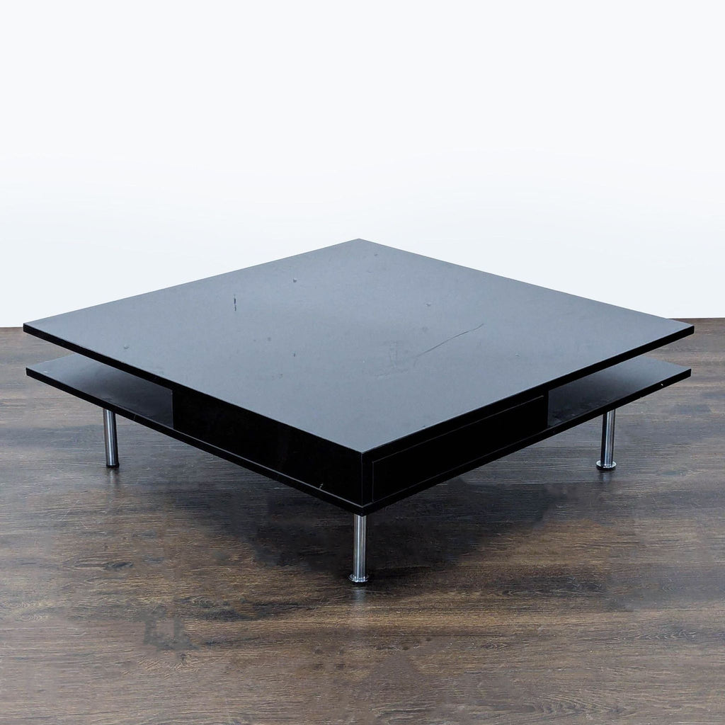 Rectangular IKEA Tofteryd coffee table in high gloss black with two drawers and a separate lower shelf.  