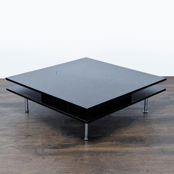 Rectangular IKEA Tofteryd coffee table in high gloss black with two drawers and a separate lower shelf.  