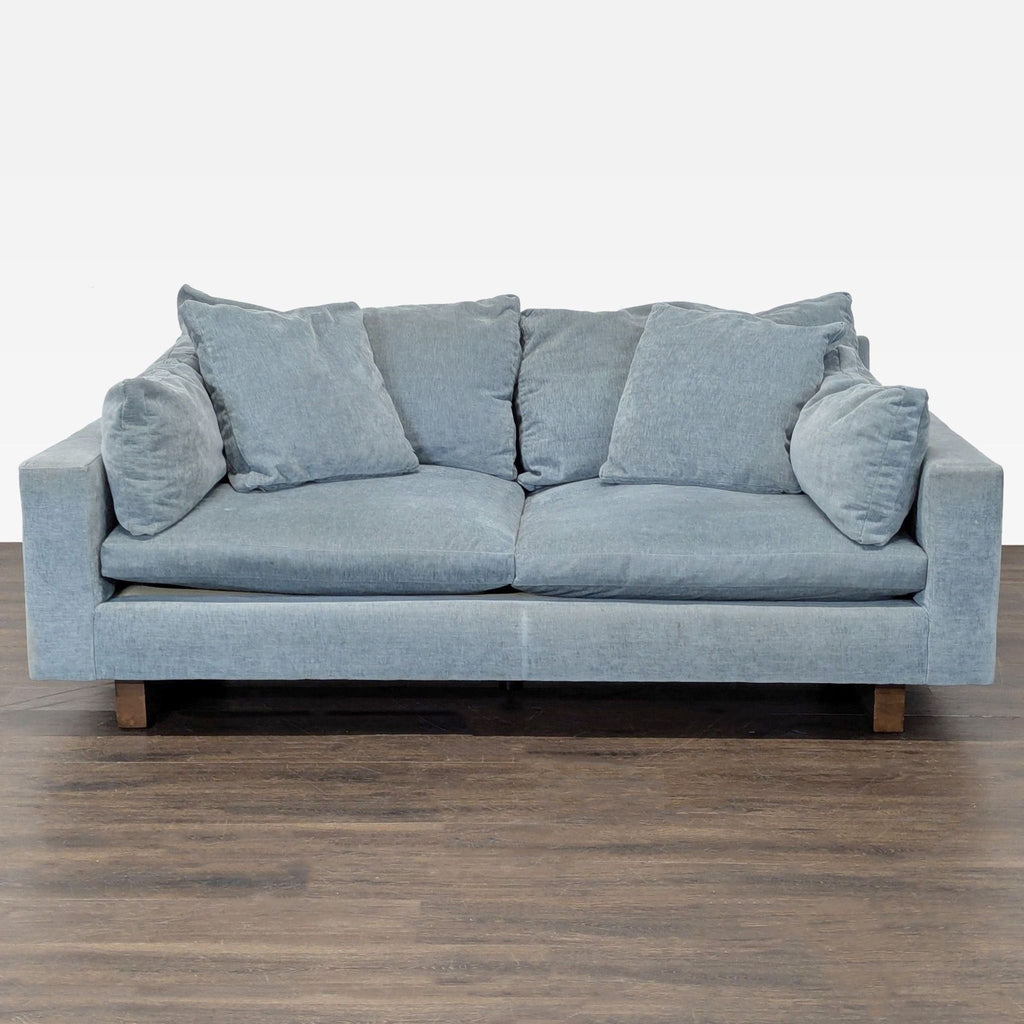 West Elm Harmony 76" 3-seat sofa in ocean blue distressed velvet, featuring dark walnut legs.  