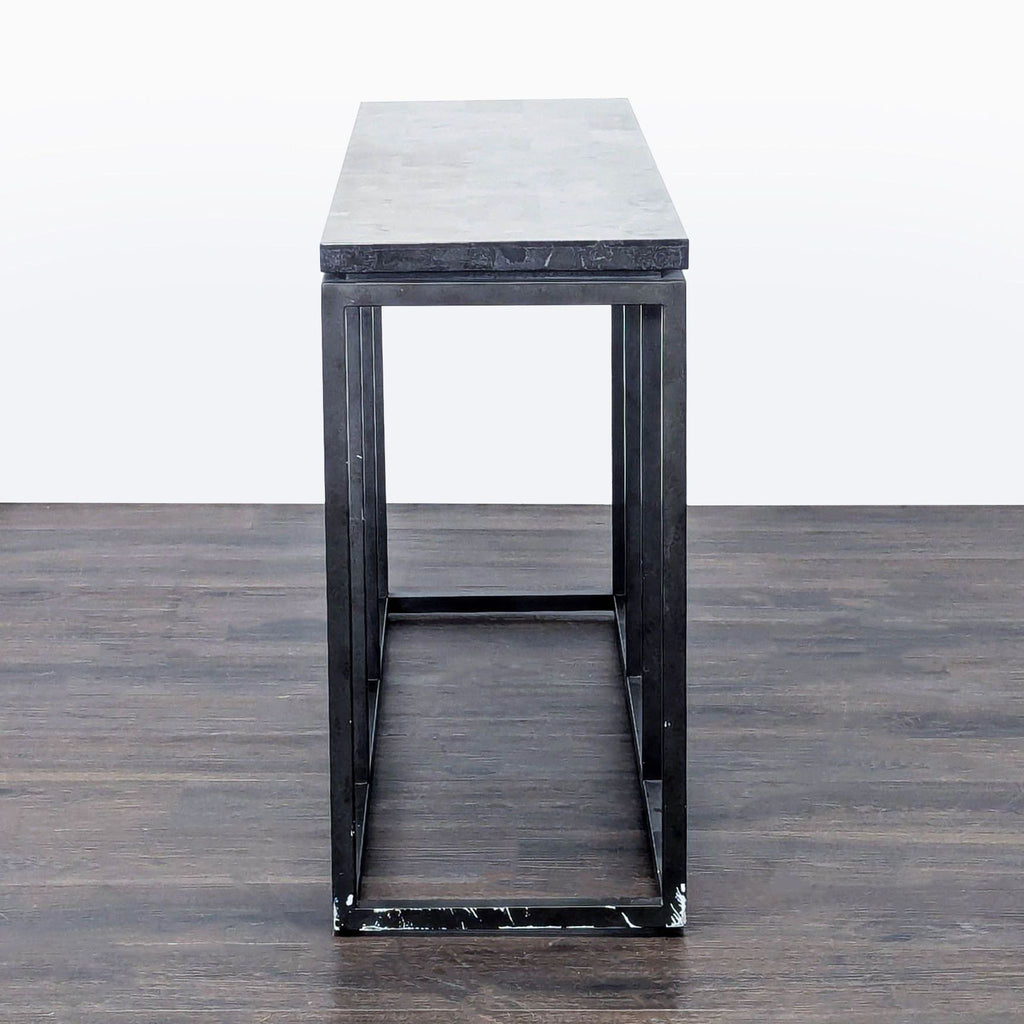 2. Broyhill console table featuring elegant legs and a smooth, rectangular tabletop design.  